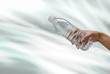 Plastic bottle with water splash