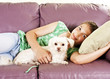 Young beautiful woman at home with her cute dog