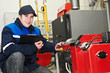 heating engineer repairman in boiler room heating engineer repairman in boiler room