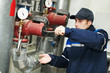 heating engineer repairman in boiler room heating engineer repairman in boiler room