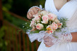 Bride with bouquet, closeup Bride with bouquet, closeup