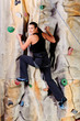 Photo: woman on rock wall woman on rock wall