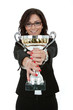 joyful female entrepreneur holding a trophy