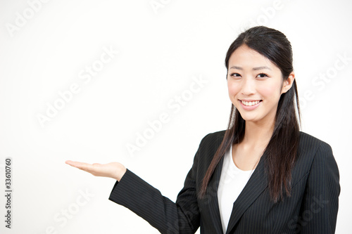 Photo: a portrait of asian businesswoman showing a portrait of asian businesswoman showing