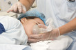 Photo: Child patient receiving artificial ventilation Child patient receiving artificial ventilation