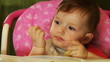 little baby eat boiled potatoes