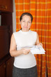 woman with utility bills woman with utility bills