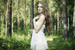 Portrait of romantic woman at fairy forest