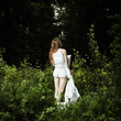 Portrait of the young woman in mysterious wood