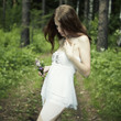 Portrait of romantic woman at fairy forest
