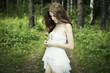 Portrait of romantic woman at fairy forest