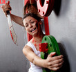 Photo: Terrified young woman clinging on for her life Terrified young woman clinging on for her life
