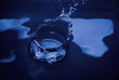 splashes  of  water on a blue background