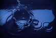splashing rippling water on a blue background