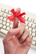 Red bow on finger