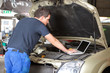 Mechanic using laptop