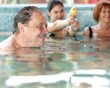 Generations having fun at swimming pool