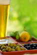 beer glass with olives