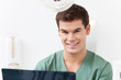 Photo: Young dental assistant smiling Young dental assistant smiling