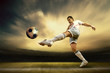 Foto: Shoot of football player on the outdoor field Shoot of football player on the outdoor field