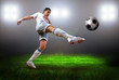 Foto: Happiness football player after goal on the field of stadium wit Happiness football player after goal on the field of stadium wit
