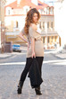 Photo: young lady standing back young lady standing back