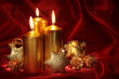 Christmas candles on a red background Christmas candles on a red background