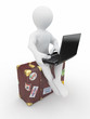 Man with laptop on the luggage