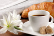 Breakfast with newspaper, croissant and coffee Breakfast with newspaper, croissant and coffee