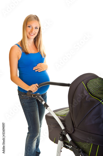 Photo: Pregnant woman with baby carriage isolated on white Pregnant woman with baby carriage isolated on white