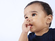 Photo: Indian Cute Baby Sucks on His Finger Indian Cute Baby Sucks on His Finger