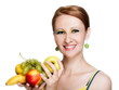 Young caucasian woman holding fruit