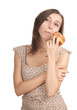 Photo: young woman in bright dress eating tasty cake young woman in bright dress eating tasty cake