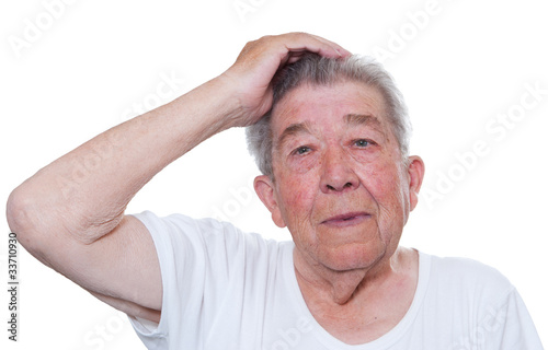 Foto: Senior hält eine Hand über den Kopf Senior hält eine Hand über den Kopf