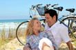 Couple resting by the sea