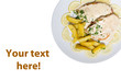 Chicken with potatoes in a dish with copy-space