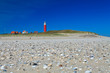 Seaside with sand dunes and lighthouse Seaside with sand dunes and lighthouse