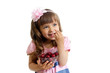 little girl with cherry berries bowl in studio isolated