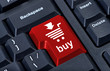 Computer red button buy with cart, internet trade concept.