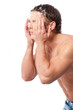 Young man wash face