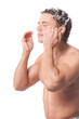 Young man wash face