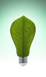 Photo: Ecological concept, leaf and lamp mix together Ecological concept, leaf and lamp mix together