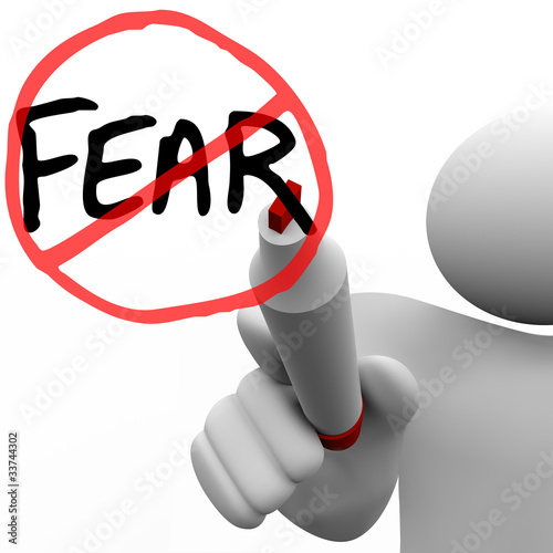 Illustration: Getting Over Fear - Man Draws Circle and Slash Over Word Getting Over Fear - Man Draws Circle and Slash Over Word