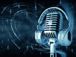 Microphone with headphones on musical background