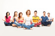 young casual people at yoga course