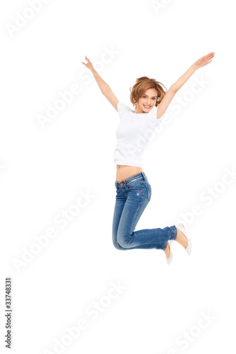 Photo: young woman jumping young woman jumping