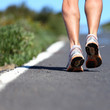 Running shoes on road Running shoes on road