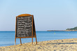 Menu board on the beach