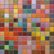 Mosaic wall with glass tiles with reflection
