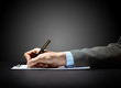 businessman's hand with pen